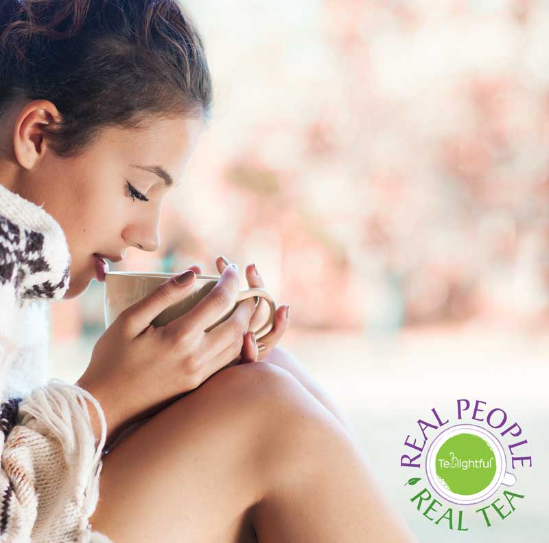 Girl sipping calming Jasmine tea.